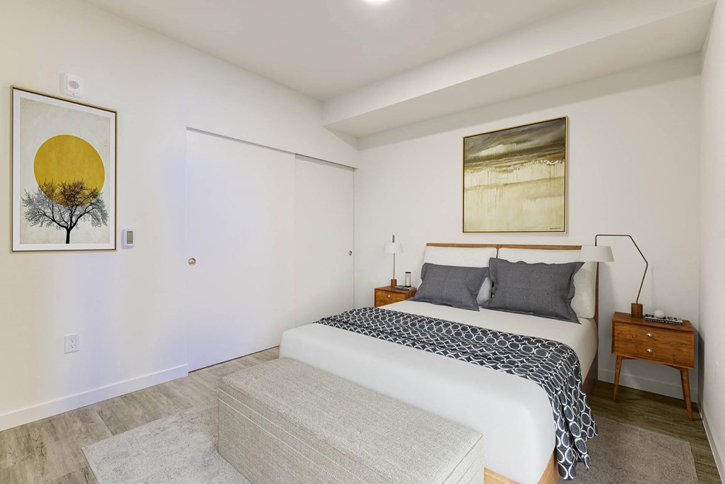 bedroom in a bedroom plus den unit.