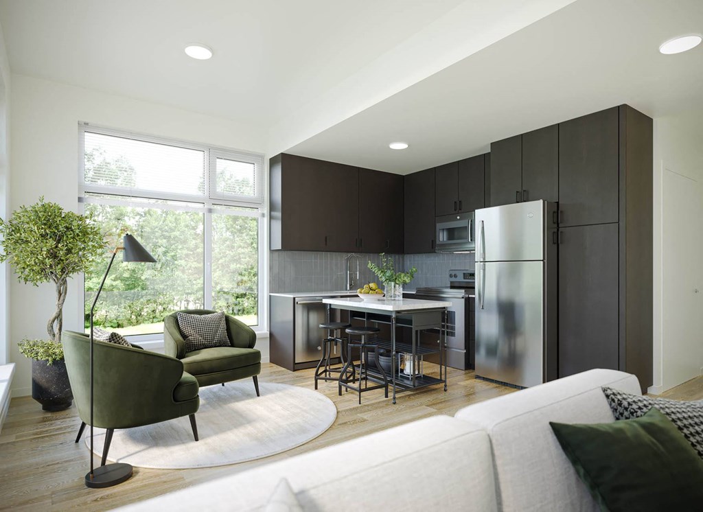 a kitchen with dark cabinets and a large window at Rivulet, Silverdale, WA