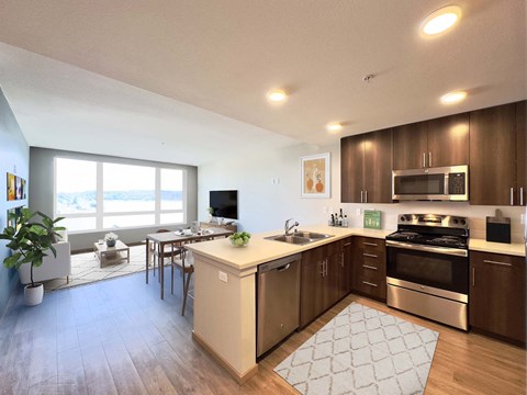 A kitchen with a stove, oven, and sink  at Spyglass Hill Apartments, Bremerton, 98337