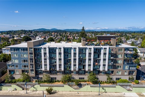 an aerial view of an apartment building overlooking the city at Spyglass Hill Apartments, Bremerton, WA 98337