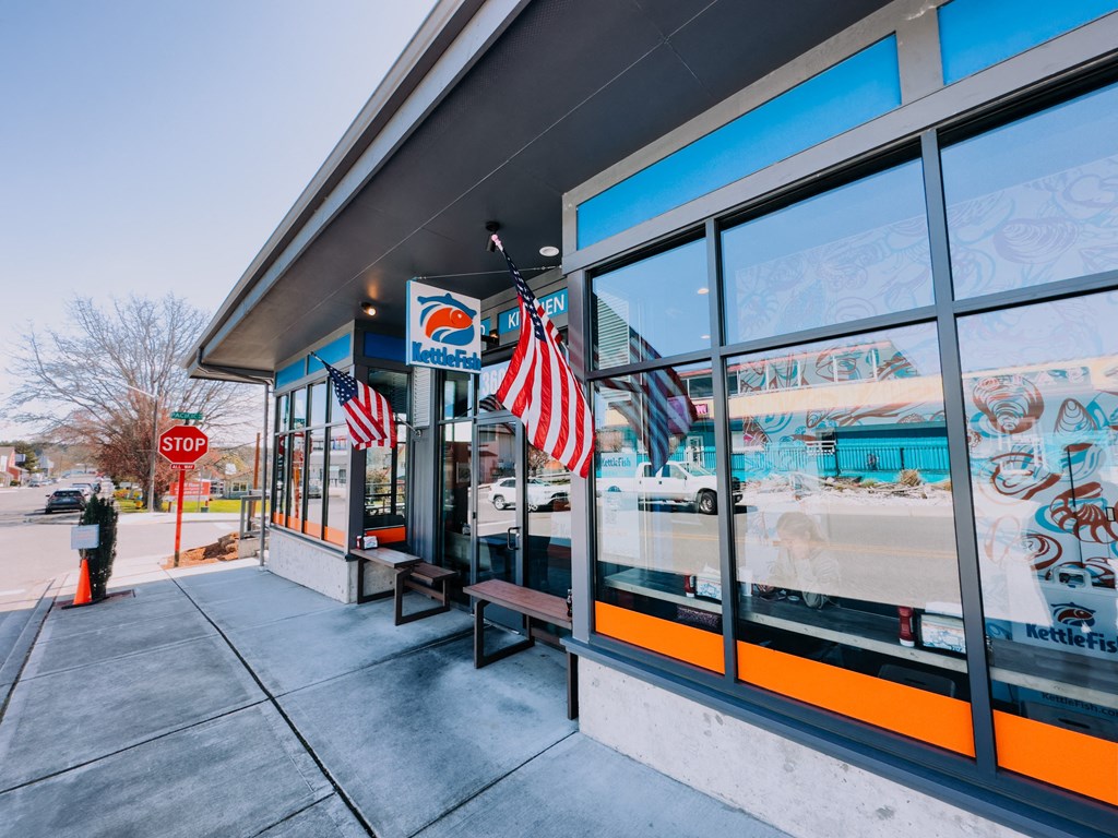 a pepsi store with an american flag hanging in front of it at Rivulet, Washington, 98383