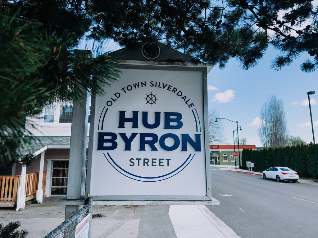a sign in front of a building with the words hud byron street on it at Rivulet, Silverdale, WA