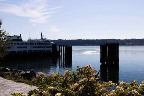 A large white boat is docked at a pier  at Spyglass Hill Apartments, Bremerton, 98337