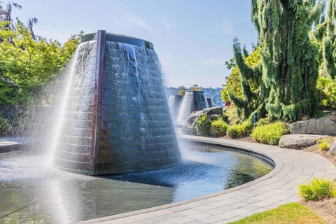 A water fountain in the middle of a garden  at Spyglass Hill Apartments, Bremerton, 98337