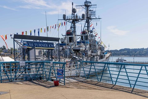 A large ship named USS Turner Joy is docked at a pier  at Spyglass Hill Apartments, Bremerton, 98337