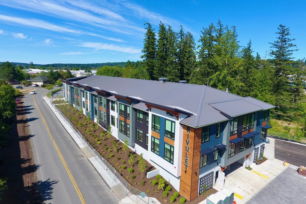 an aerial view of a building with a metal roof at Rivulet, Silverdale, WA