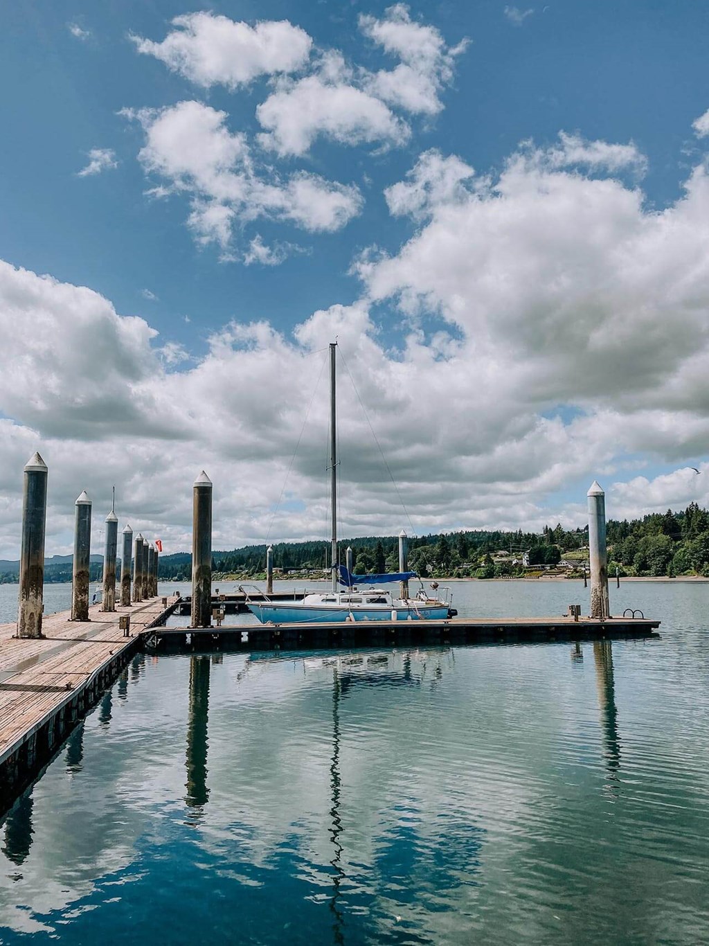 a small boat on a body of water at Rivulet, Washington, 98383