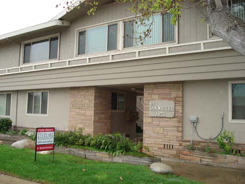 a house with a foreclosure sign in front of it