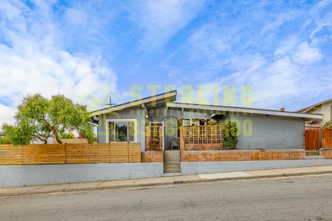 A building with a sign that says "STARLING" in front of it.