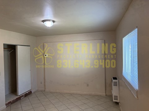 A Sterling Property Management office is shown with a phone number on the wall.