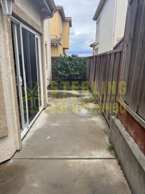 A narrow alley with a "STOP" sign written on the wall.