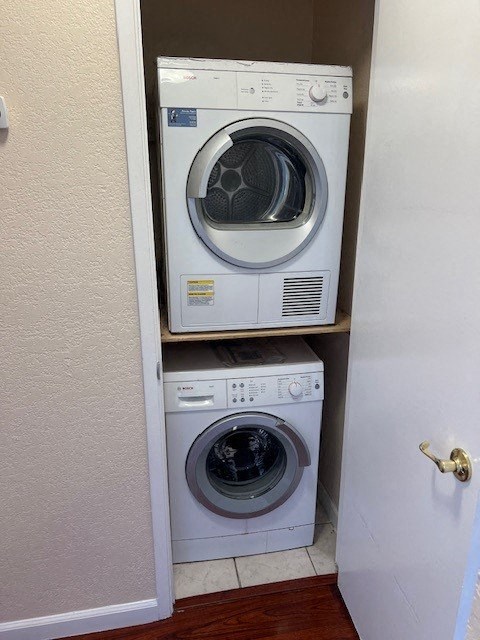 a washing machine and a dryer in a small closet