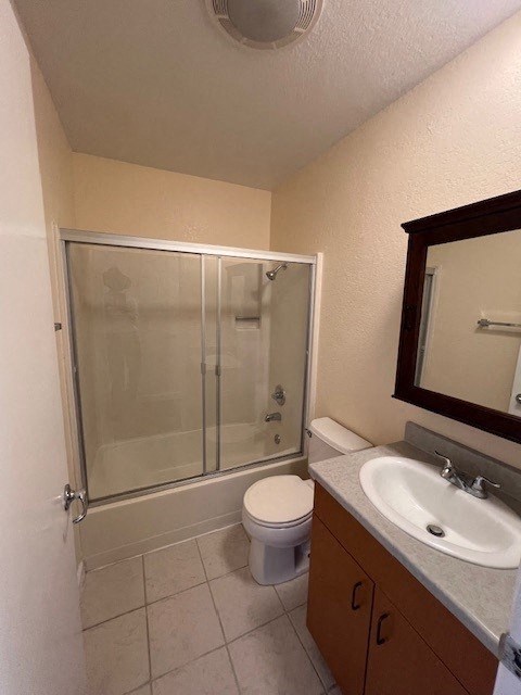 a bathroom with a sink toilet and a shower