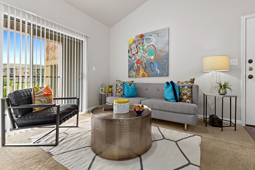 Living Area with large window at Bella Madera Apartments, Lewisville, TX