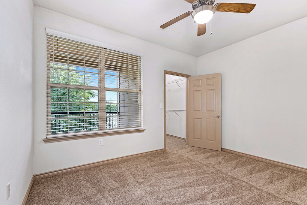 empty bedroom with a window
