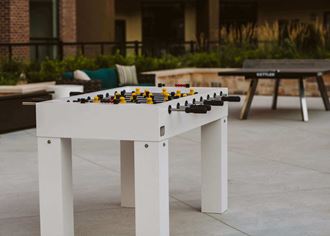 a foosball table on an outdoor patio