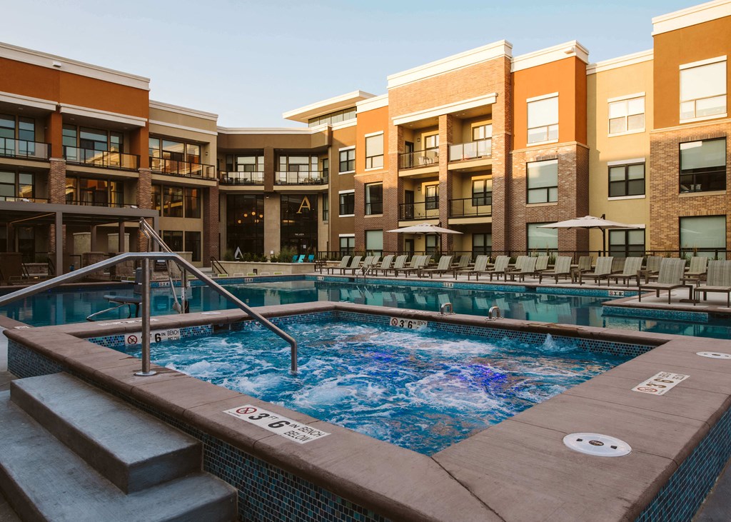 outdoor hot tub surrounded by apartment homes at The Apex at CityPlace, Overland Park, Kansas