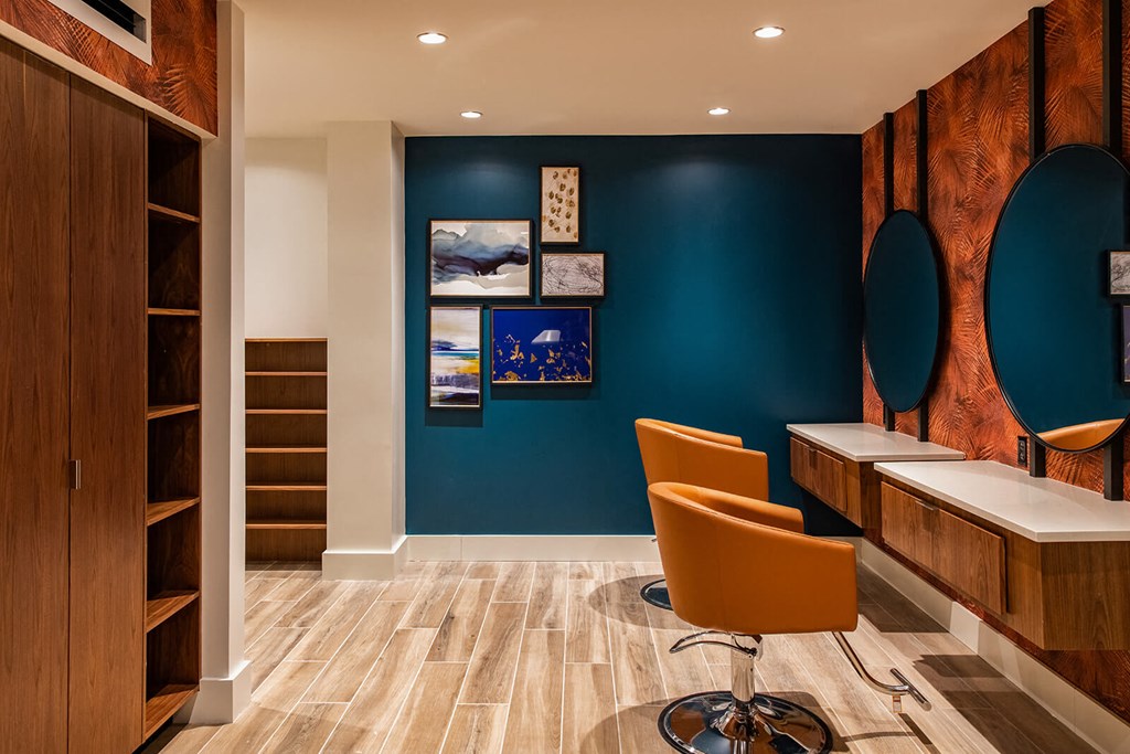 office with two chairs at desks, shelving, and circular mirrors on the wall at The Apex at CityPlace, Overland Park, 66210