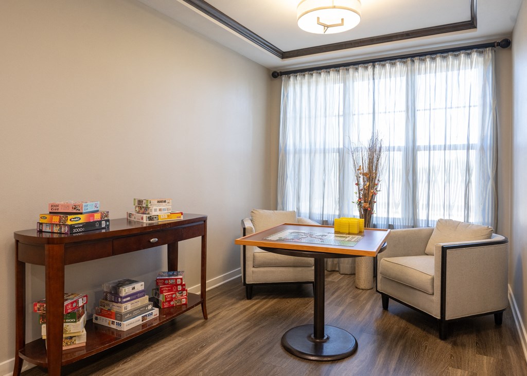 A puzzle activity seating area at Aspen Ridge 55+ Active Adult Community