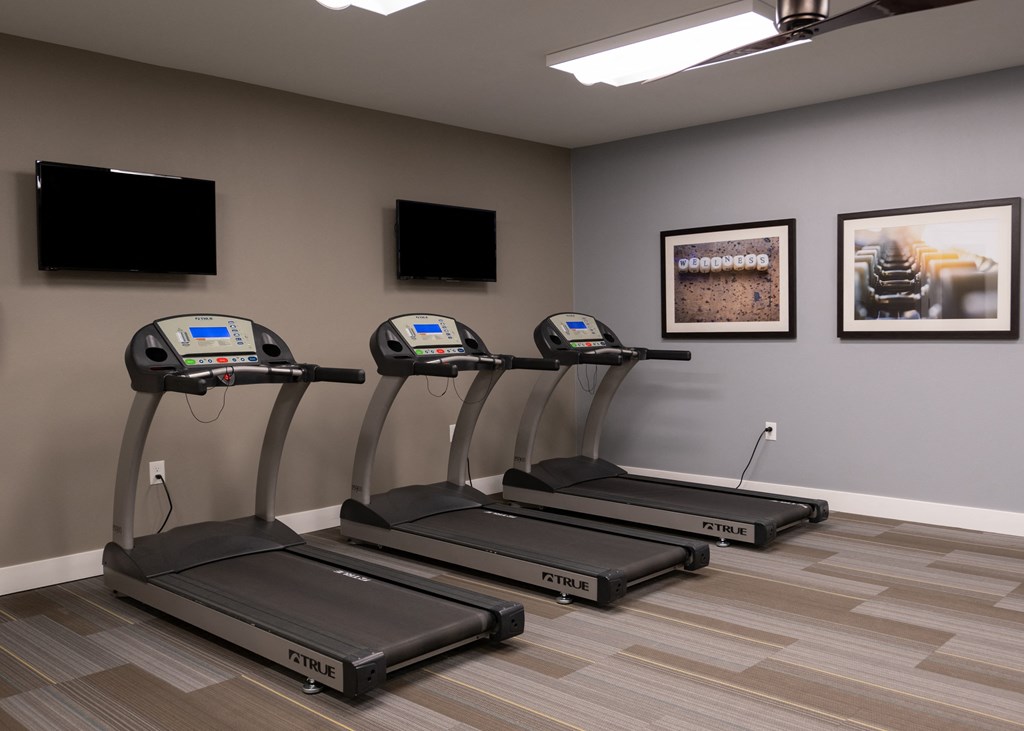 Fitness Center with treadmills at Aspen Ridge 55+ Active Adult Community in Olathe, KS