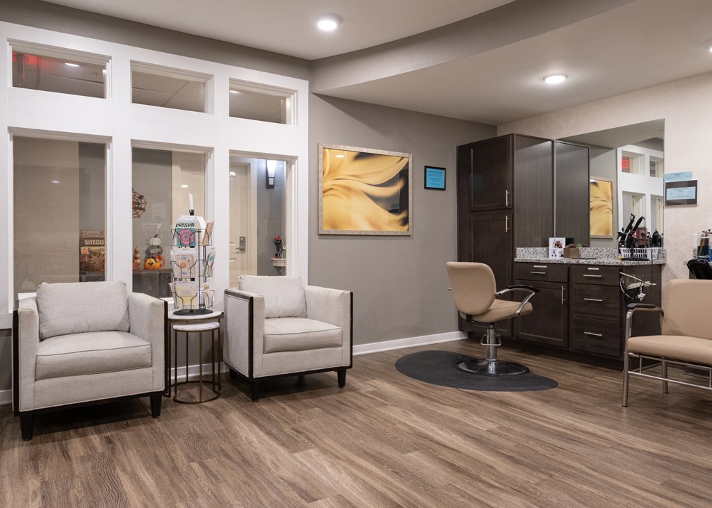 A salon with chairs at Aspen Ridge 55+ Active Adult Community