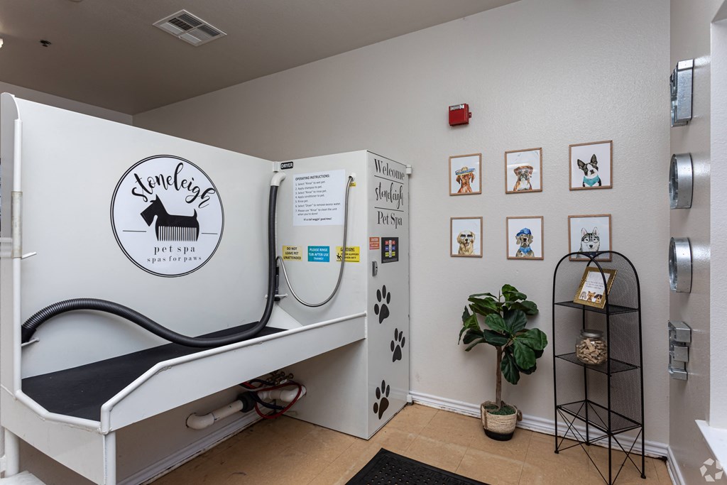 a rehabilitation room with a treadmill and a refrigerator and a plant