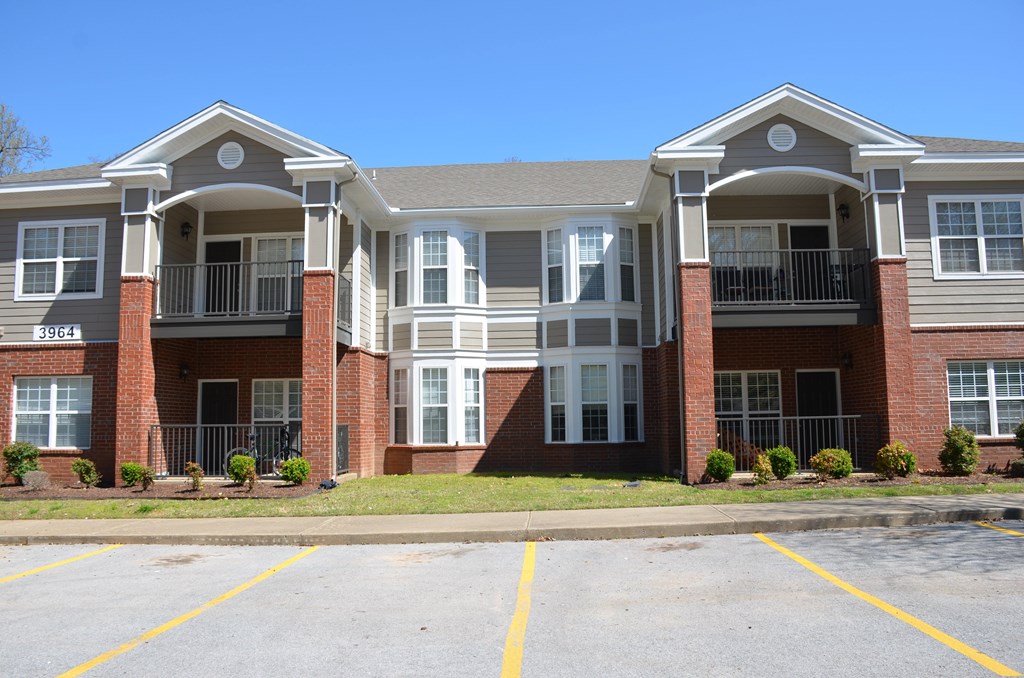 Apartment building with number 3864 on the front.