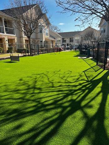 a green lawn in front of a building - Photo Gallery 26