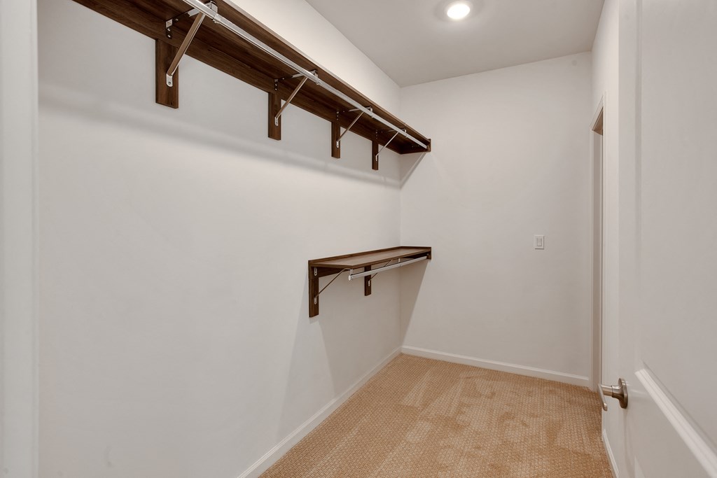 Closet with hanging racks at 44 Washington, Kansas City, MO 64111