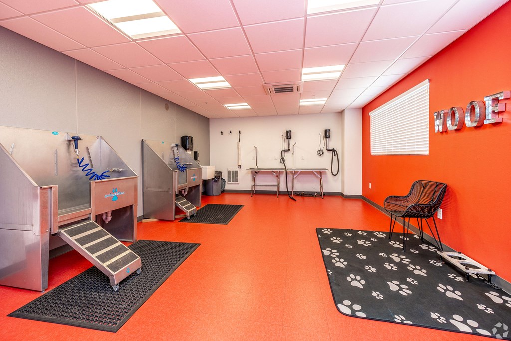 a large room with machines and chairs in it