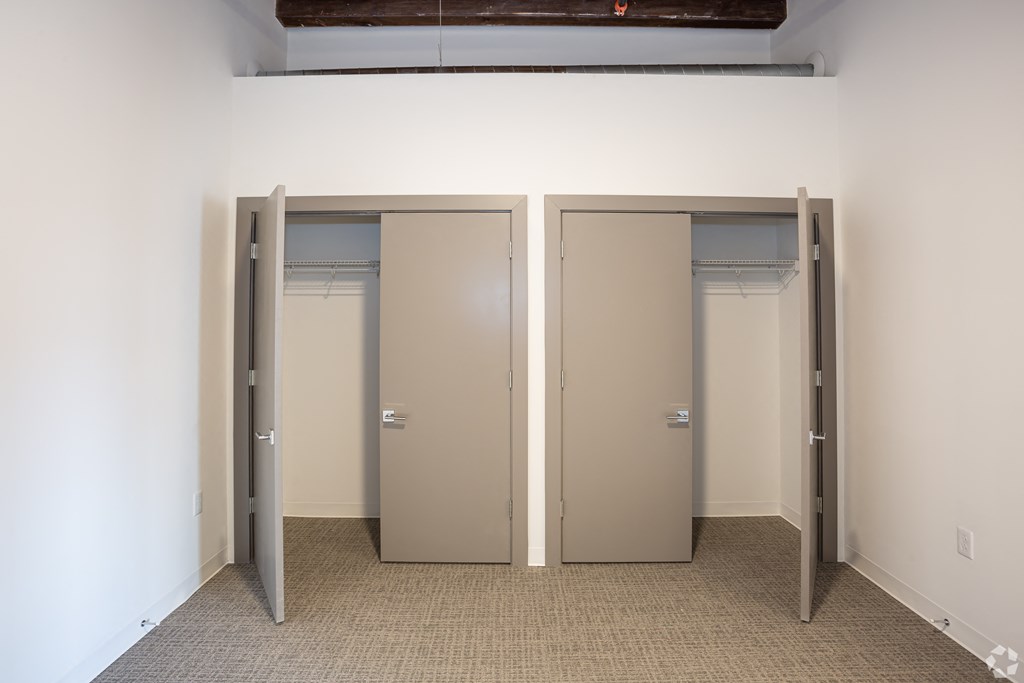 a row of sliding glass doors in a room