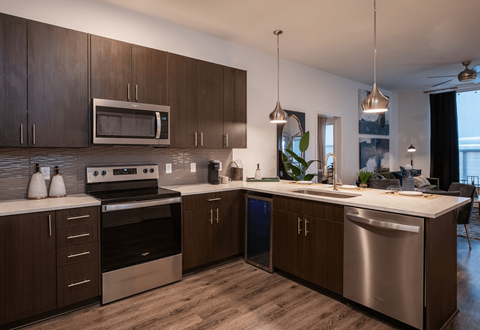 a kitchen with stainless steel appliances and wooden cabinets, The View at Castle Rock, CO