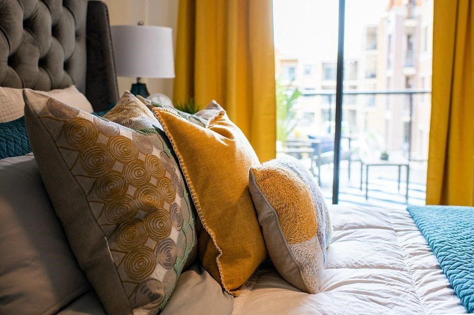 Bedroom with bed and pillows at 44 Washington, Kansas City, 64111