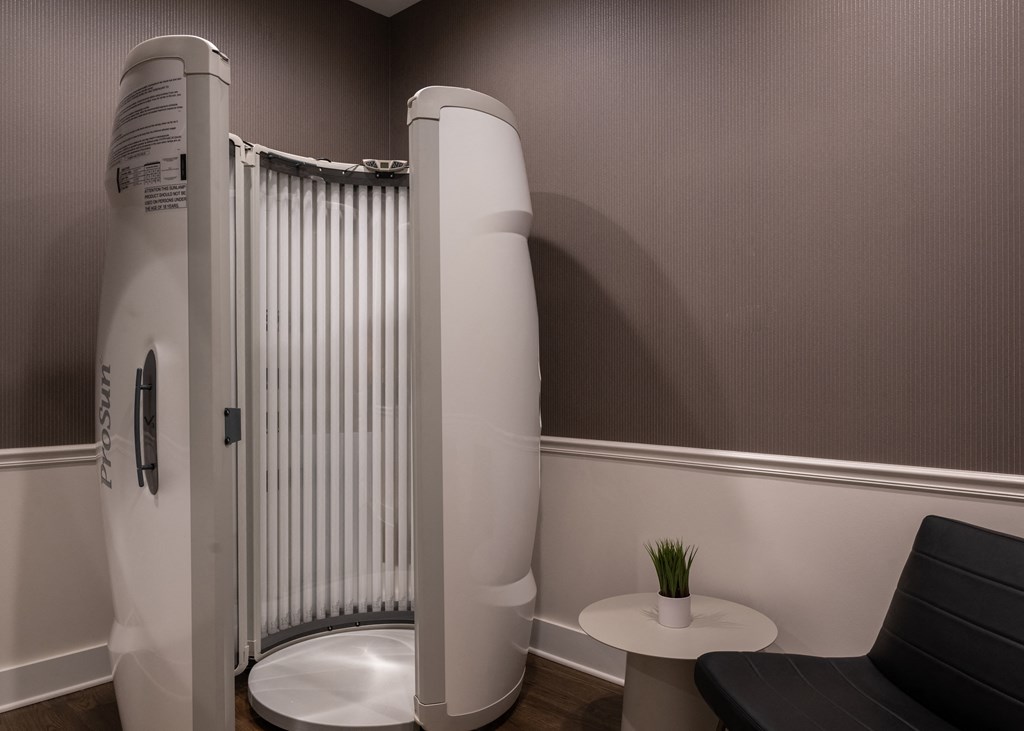 a small bathroom with a shower and a toilet in it  at The Clearing at ONE28, Kansas