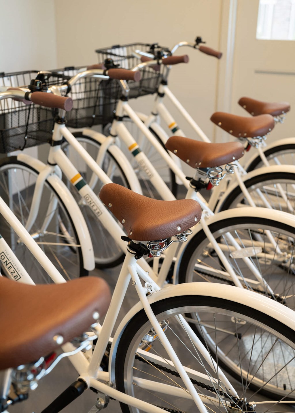 a row of bikes parked next to each other