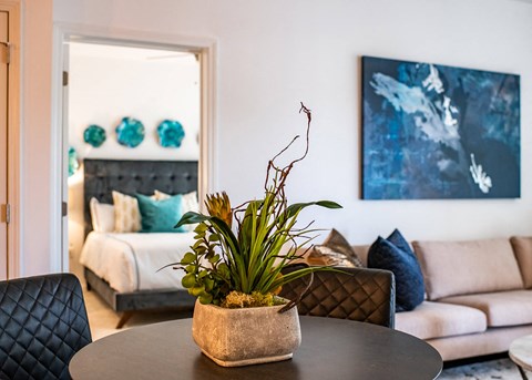 Living room with cream couch at The Villas at Waterside, Lenexa