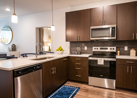 Kitchen with appliances at The Villas at Waterside, Kansas