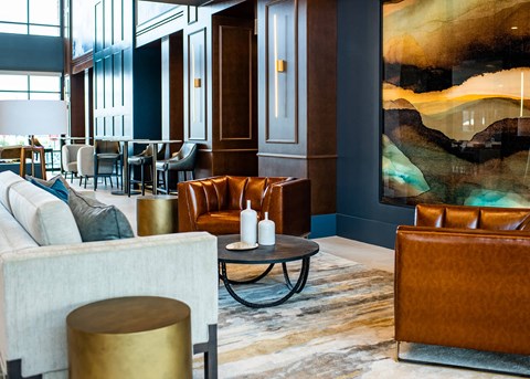 Couch in living room with table at The Villas at Waterside, Kansas, 66214