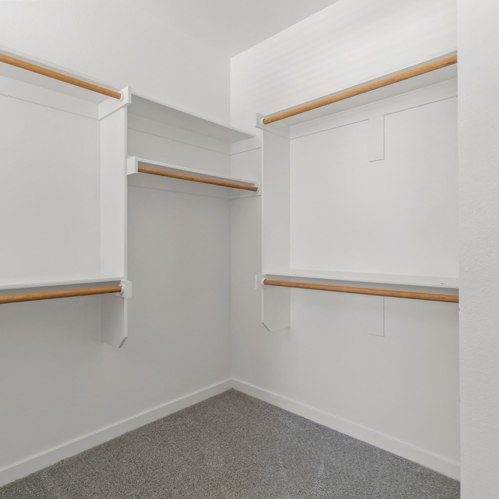 walk in closet with carpet at Hillcrest Village, Springdale Arkansas