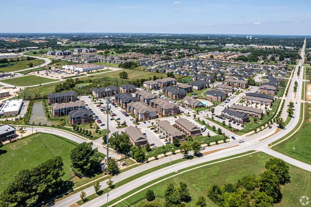 an aerial view of a suburb of a city with houses