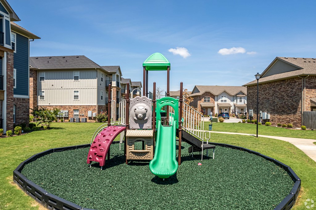 the preserve at ballantyne commons playground with slide and other playground equipment