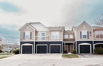 a house with two car garages  at Centennial Park Apartments, Overland Park, 66213 - Photo Gallery 3