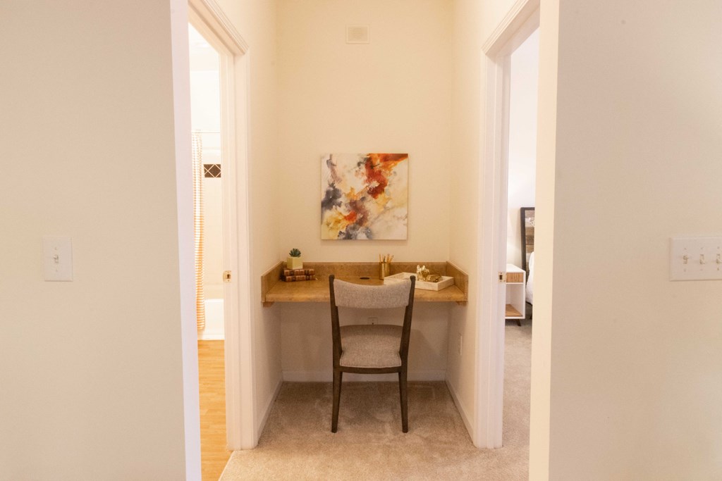 A room with a desk and a chair. at The Crest at Sugarloaf, Lawrenceville, 30044