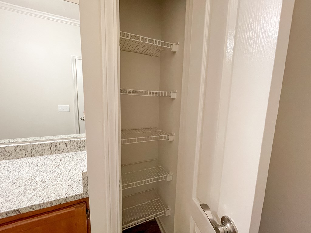 Bathroom Linen Closet with Shelving located in Lawrenceville, GA
