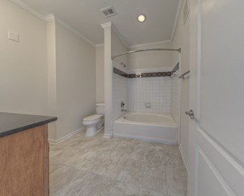 Bathroom with garden style tub at The Crest at Sugarloaf, Lawrenceville, GA - Photo Gallery 24