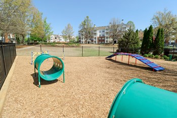 our apartments showcase a dog park with a playground - Photo Gallery 20