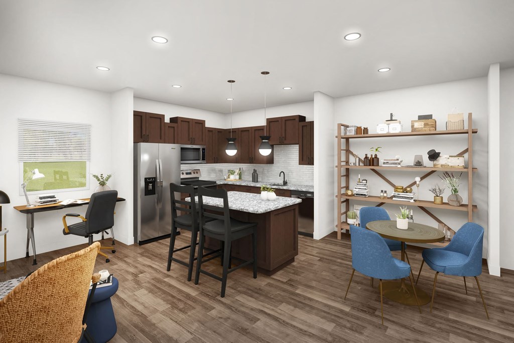 an open floor plan with a kitchen and dining areaat The Crest at South Point, McDonough Georgia