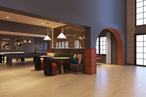 A modern living room with a large sofa and a coffee table.