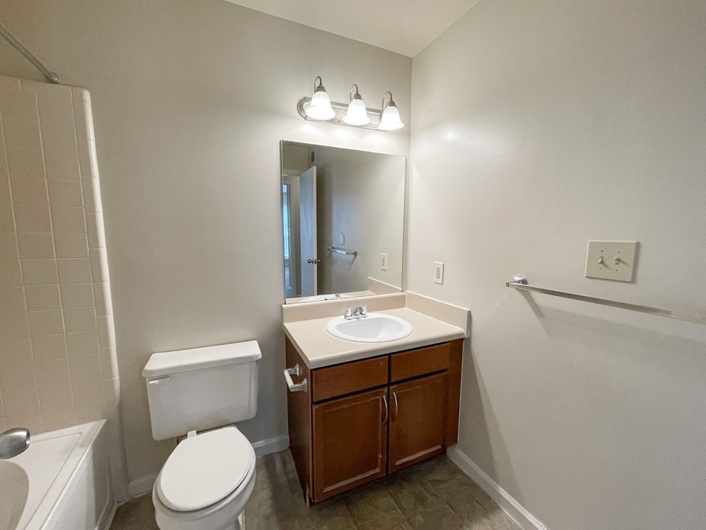 Drayton bathroom with wood cabinet vanity located in Duluth, GA 30096