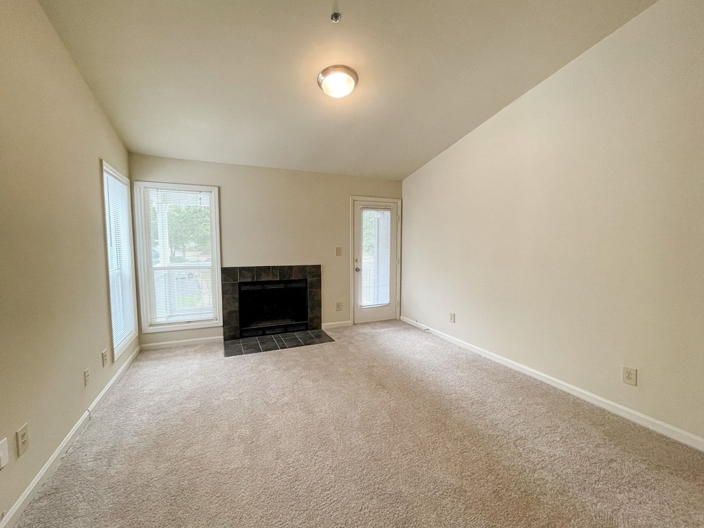 Drayton living space with vaulted ceilings located in Duluth, GA 30096